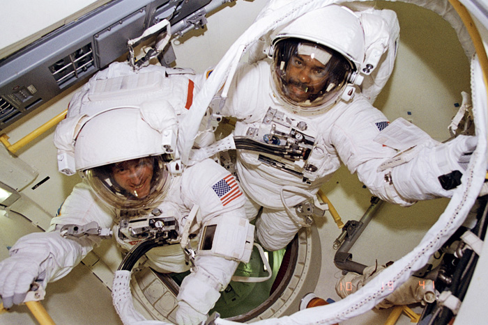 Space History Photo: Bernard Harris and Michael Foale Prepare to Leave Airlock